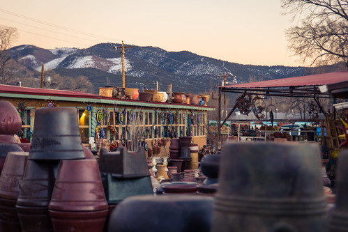 winter sunset snow mountains newmexico shop outdoors twilight indian nativeamerican pots taos nm distance giftshop closingtime