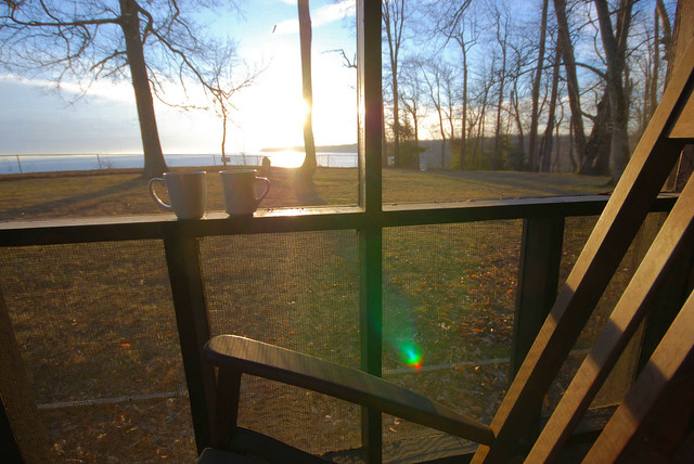 Catch the sunrise together from the rocking chairs in your enclosed porch overlooking the Potomac River at Westmoreland State Park at cabin 24