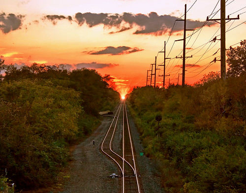 sunset sun night clouds traintracks telephonepoles sunsetclouds railroadtracks rrtracks canoneosrebelt1i eosrebelt1i everythingindiana pwfall pwpartlycloudy