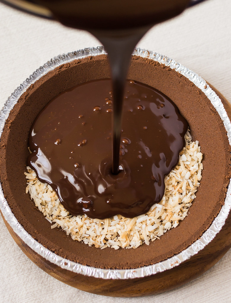 Chocolate Ganache Pie with Toasted Coconut Melted Chocolate Poured on Pie