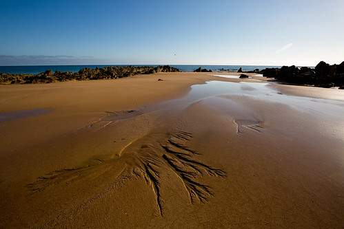 sky beach water sand patterns tide erosion tasmania burnie