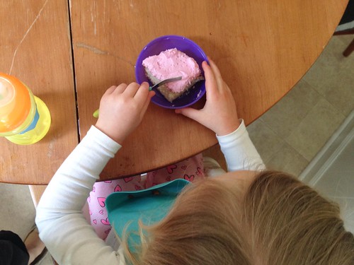 eating cake with natural, dye-free pink icing