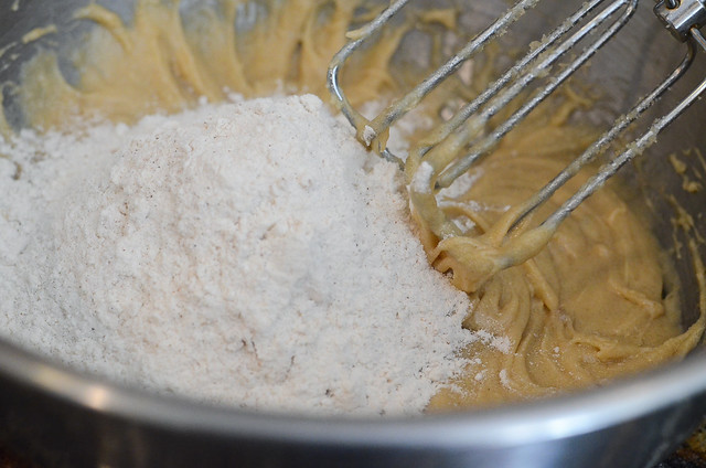 The dry ingredients are added to the mixed with the hand mixer.