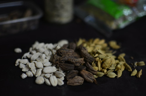 The cardamom pod lineup: white, green and black/brown
