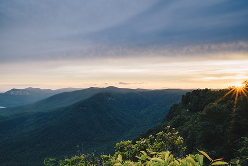 statepark travel trees sunset summer sky plants mountains nature leaves clouds forest landscape evening us twilight haze view unitedstates outdoor dusk cleveland southcarolina hills rays sunrays overlook caesarshead tablerockmountain blueridgeescarpment caesarsheadstatepark