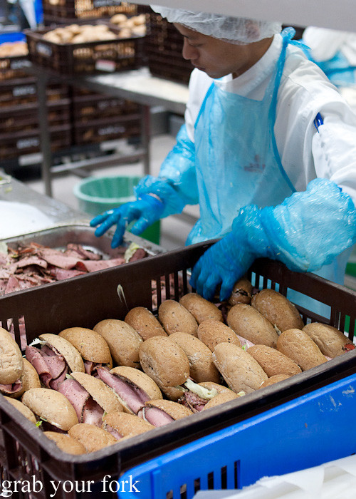 Bread roll assembly during a behind-the-scenes tour of Emirates Flight Catering