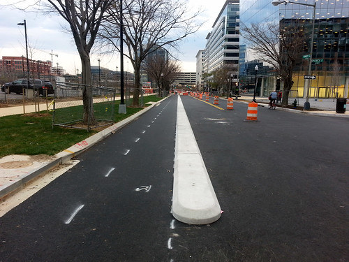 photo of DC Inspires Bike Lane Envy With Curb-Protected Cycling image