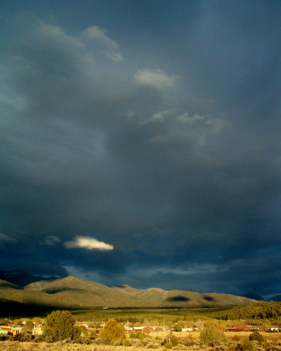 light sky storm mountains newmexico clouds landscape spring shadows sancristobal sangredecristo taosskivalley taoscounnty