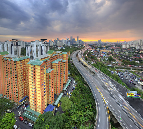 city travel light vacation urban building skyline modern skyscraper landscape outdoors corporate high asia downtown day cityscape view cloudy capital landmark center scene structure malaysia development klcc attraction