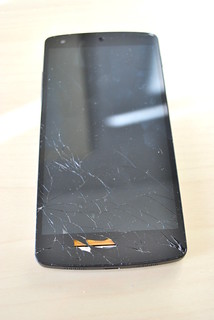 LG Nexus 5 phone with badly broken top glass