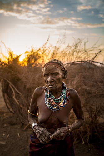 africa sunset dancing tribes omovalley ethiopia dimi omoriver triballife dimiceremony dassenachtribe omoriverdelta oldworkingwoman