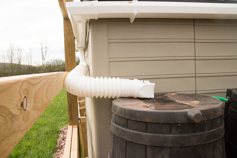 How to Build a Rainwater Catchment On a Shed Roof. It's easy to attach gutters onto your shed roof to collect water! Perfect solution for catching rainwater for your vegetable garden.