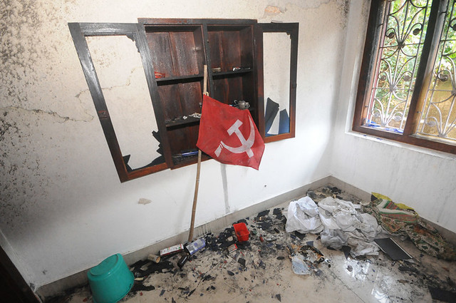 CPIM flag is seen placed in one of the houses ransacked in Nadapuram.