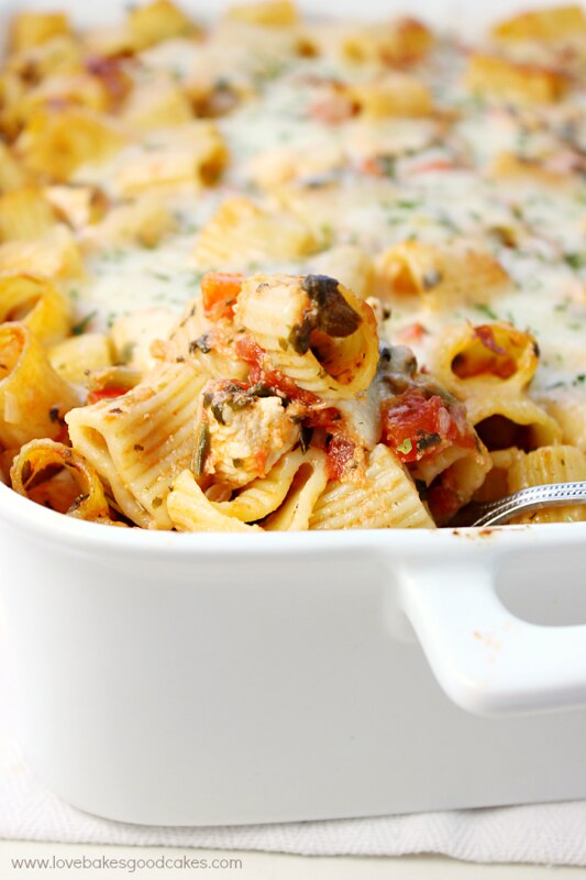 Six Cheese Chicken Pasta Bake in a baking pan close up.