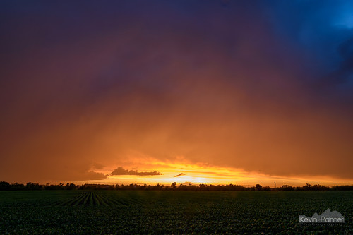 pink blue trees sunset sky orange storm color green field rain weather yellow clouds giant gold golden evening illinois spring colorful dusk may large stormy farmland thunderstorm groveland 2016 kevinpalmer tokina1628mmf28 nikond750
