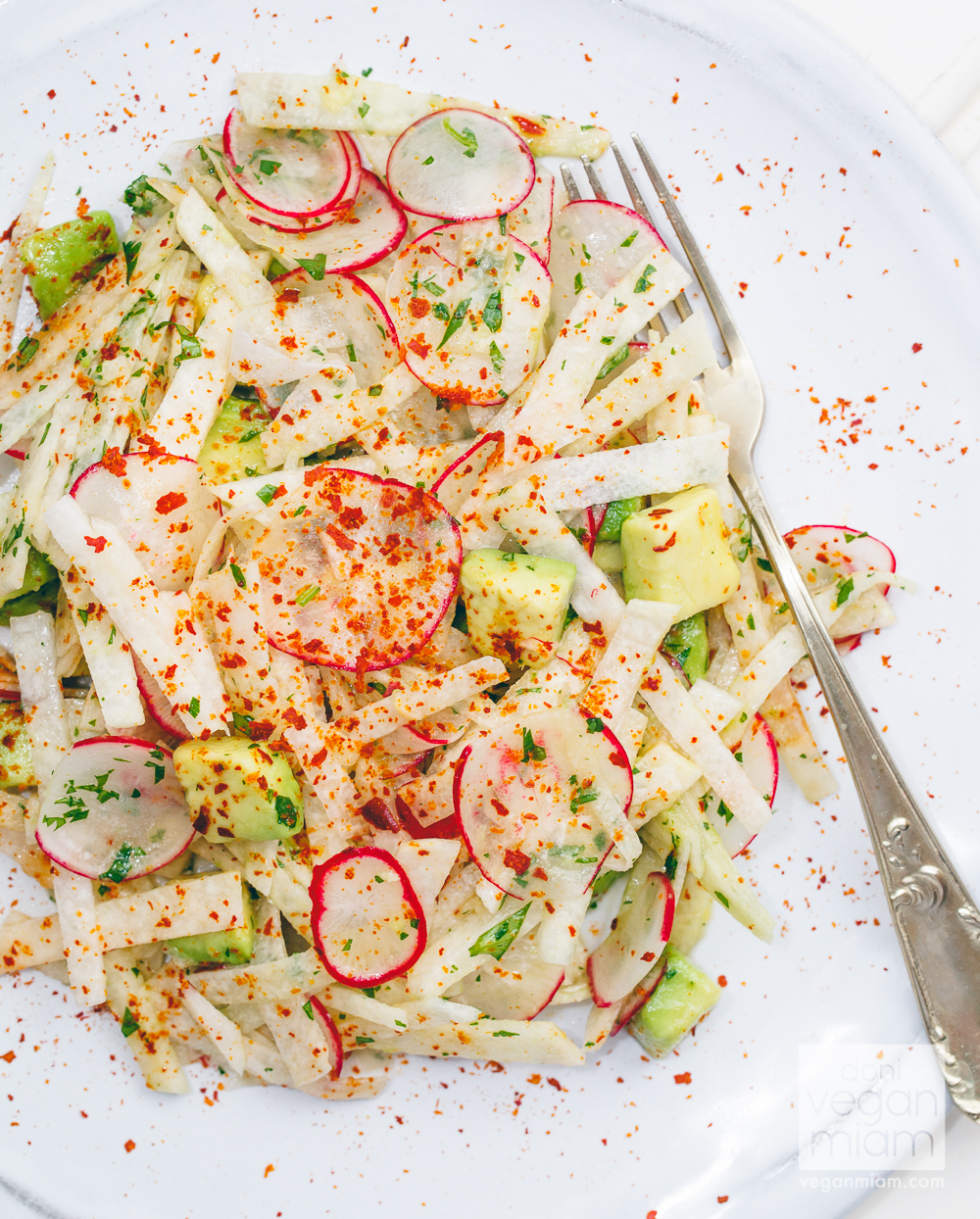 A refreshing Jicama Avocado and Radish Salad with Lime Vinaigrette with great texture and flavor, that comes together quickly and easily. Vegan