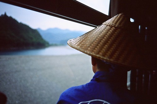 olympus xa fuji velvia 50 35mm colour reversal slide film river japan bus journey travel hat man nat geo shingu