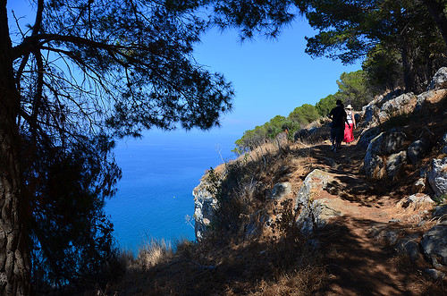 trip travel trees shadow sea summer people italy woman man nature rock forest coast chalk woods mediterranean outdoor hiking hill tourist hike medieval tourists destination sicily hiker outlook cefalu cefalù tourview cifalù