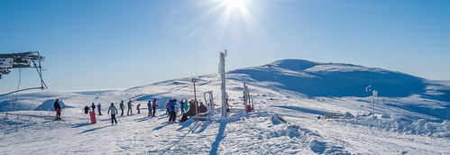 winter panorama sun snow ski day skilift slope skiers trysil