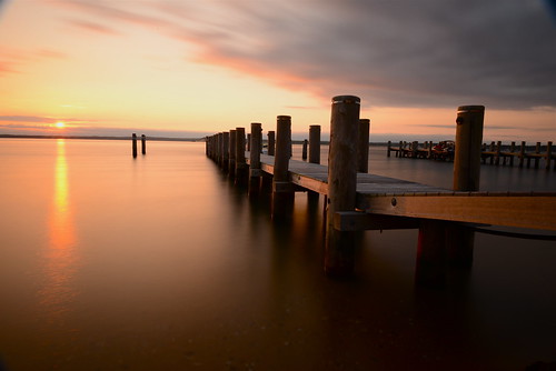 longexposure morning sun reflection beach water sunrise pier dock