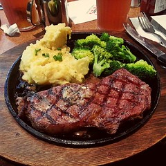 12oz Rib Eye Steak with Mashed Potatoes and Buttered Broccoli