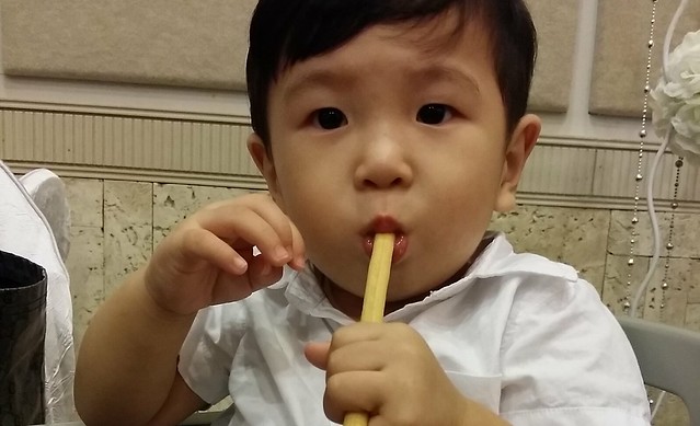 Apr 2014 - Munching at a breadstick at a wedding. 