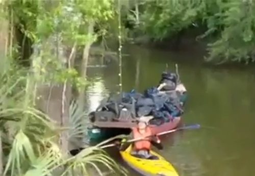 Kayak towing Canoemaran and trailer canoe