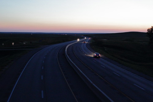 travel sunset rural america landscape lights highway dusk headlights hills transportation kansas roads flint