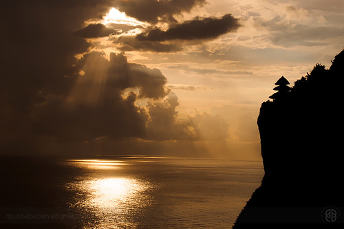 sunset sea bali cliff seascape nature indonesia landscape temple seaside olympus uluwatu rays sunrays olympuspen sunbeams baliindonesia 1240 rijubhattacharya itsrbtime olympusepl5 1240f28 olympus1240f28