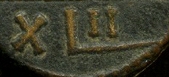 Copper 42 nummi coin showing a Vandal warrior