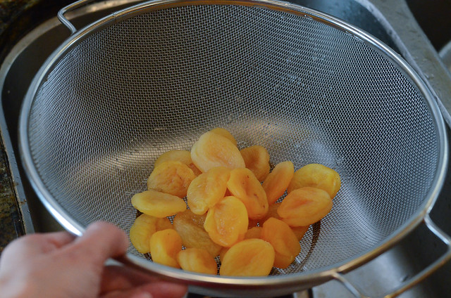 Dried apricots in a colander.