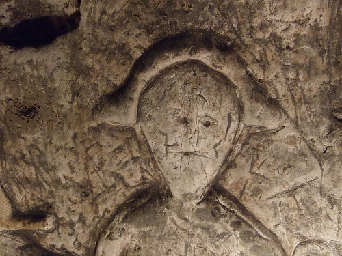 royston cave st michael or st george face
