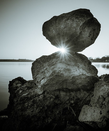 sunset blackandwhite lake water rocks stackedstones
