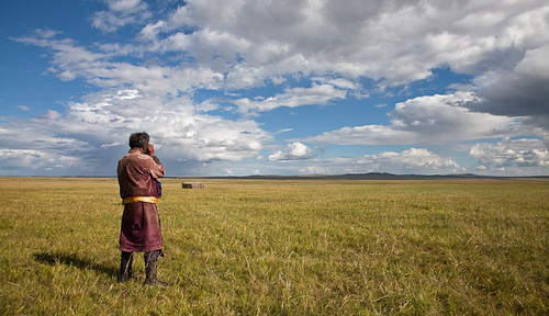 sky man grass clouds looking mongolia steppe mongolian herder dornod