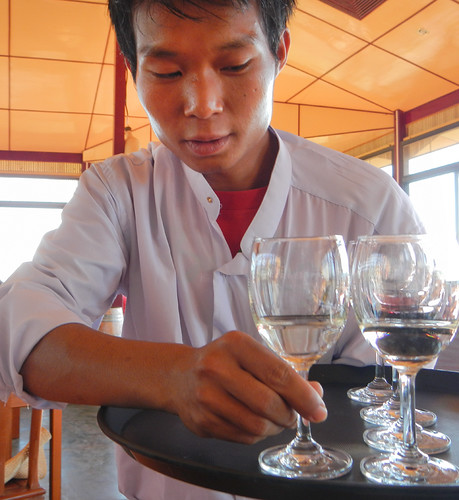 Server at the Inle Lake Winery in the Town of Nyaung Shwe, Myanmar