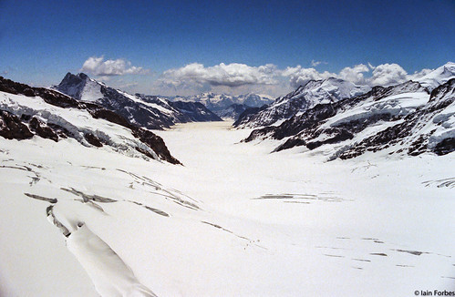 blue camping people white snow black mountains alps film ice scale clouds landscape switzerland scenery ae1 hiking scenic unesco worldheritagesite glacier blueskies puffy jungfraujoch 1990 glacierhiking puffyclouds valais aletsch whs berneseoberland whiteclouds firn crevasses tributary mountainscenery aletschglacier europeanalps jungfraufirn tributaryglacier