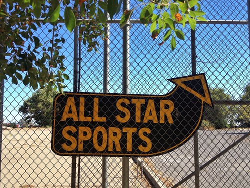 street city urban sports jock sign fence athletic view manly letters player direction handpainted lonely arrow lettering roadside pointing stockton allstar hormones thisway dirtymind questionabledesign