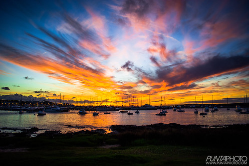 ocean sunset sky cloud sun reflection water port lights rocks colours yachts