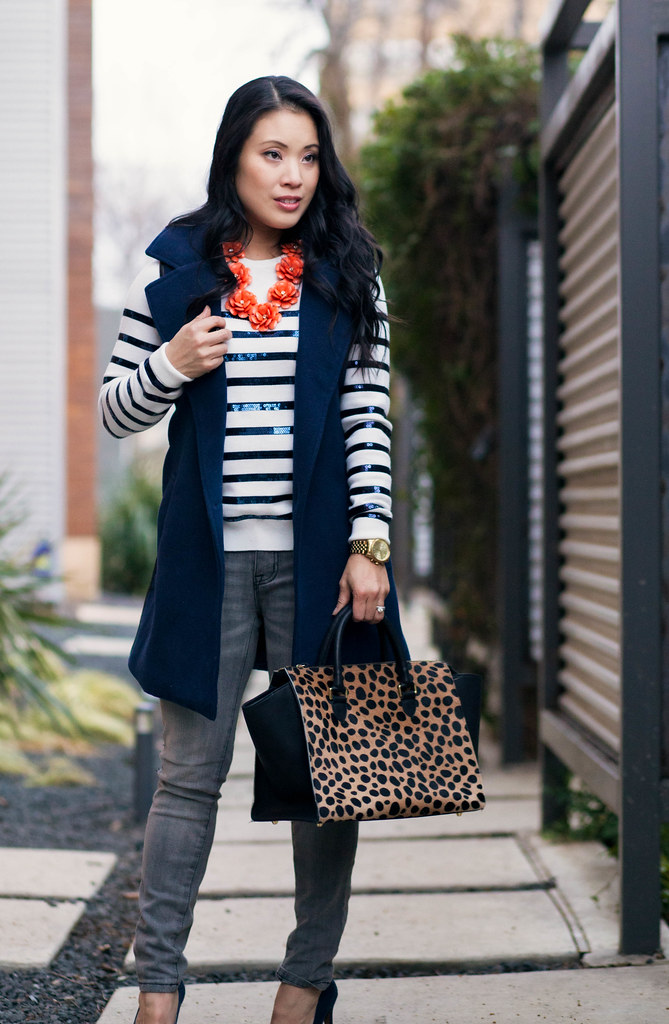 https://cuteandlittle.com | petite fashion blog | navy sleeveless wool trench, sequin stripe sweater, gray jeans, leopard bag outfit