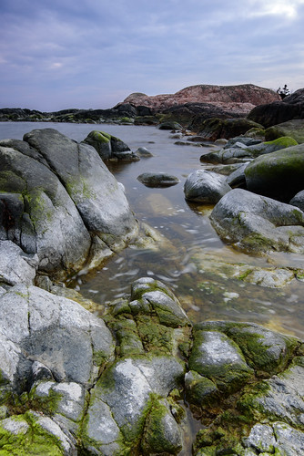 sea sky water rock stone clouds landscape rocks waterfront sweden outdoor shore sverige uppland roslagen väddö