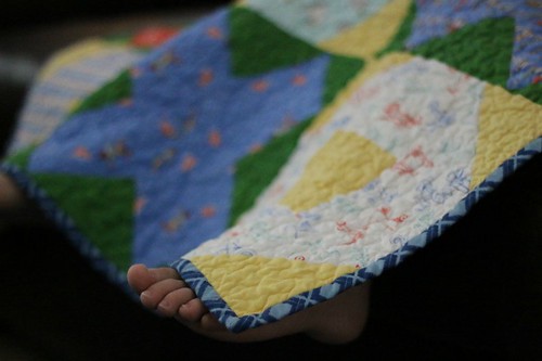 Soon some tiny toes will be hiding under this quilt