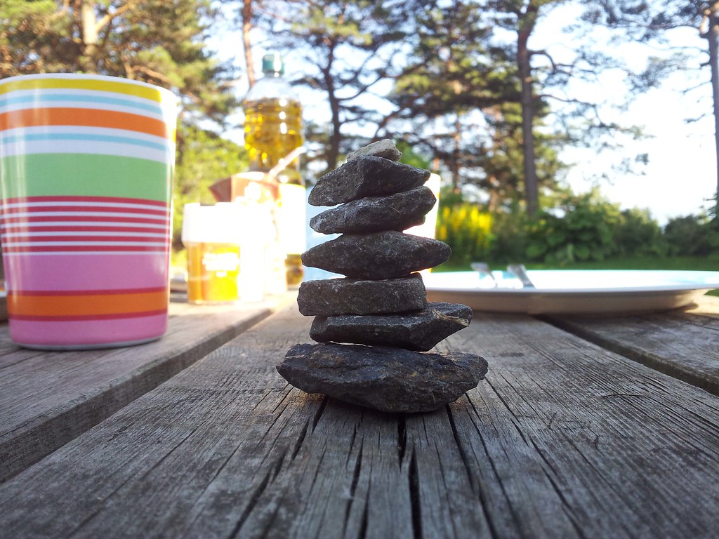 A good luck charm cairn on the picnic table