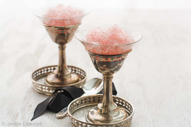 Two coupes of rosé champagne granita.