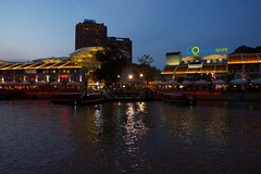 Clarke Quay by the Singapore river at dusk