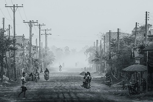 road village motorbike electricity dust laos rider lao champasak theworldthroughourlenses