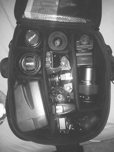 camera white black 35mm bag lens polaroid 50mm nikon jake body flash telephoto change nikkor bodies weber lenses d7000