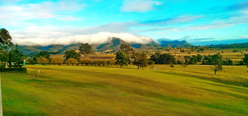 panorama mountain grass clouds view country