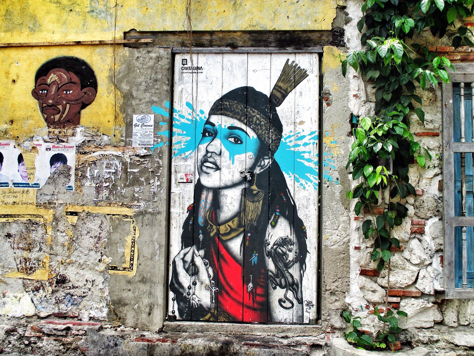 Young Indian boy graffiti by Fin DAC in Cartagena, Colombia