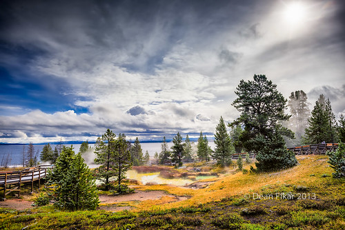 park morning blue sky sunlight lake water beauty fog clouds fence landscape nationalpark spring view unitedstates vibrant awesome famous landmark basin steam national yellowstonenationalpark yellowstone wyoming geyser sulfur thermal conifers westthumb