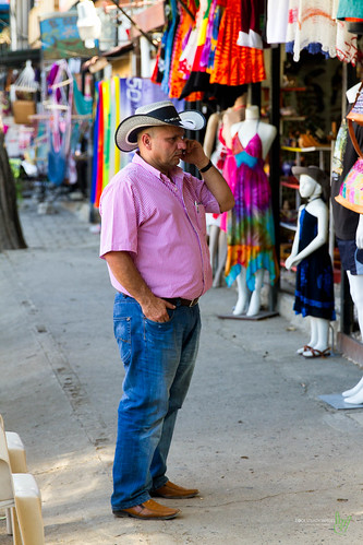 camera pink vacation man hat shirt canon eos costarica cowboy phone boots stripes events streetphotography cell places equipment jeans coco cameras 7d processing handheld 200views 50views lenses topaz riu guanacaste 25views niksoftware bypaulchambers canonef2470mmf28iiusm lightroom4 photoshopcs6 rocksteadyimages